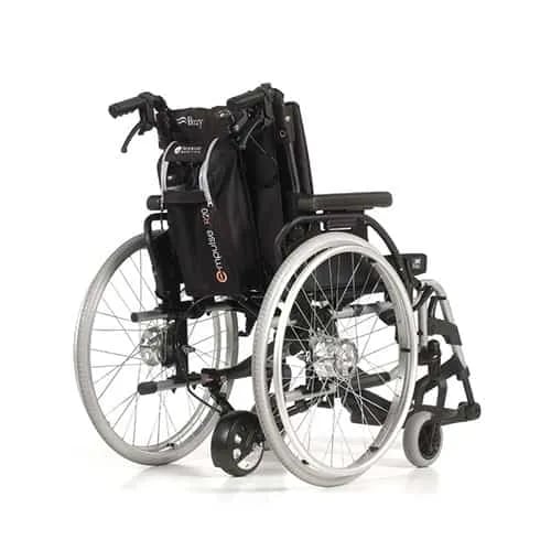 lightweight folding powerpack attached to wheelchair